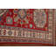 Tapis rouge à motif géométrique Kazak