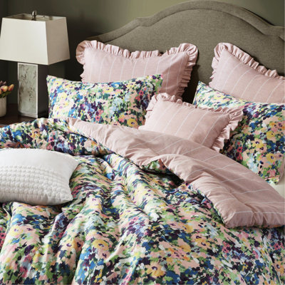 Couette 8 pièces pour lit king, motif floral abstrait, finitions soignées, imprimé numérique, jupe de lit sur mesure et rembourrage moelleux.