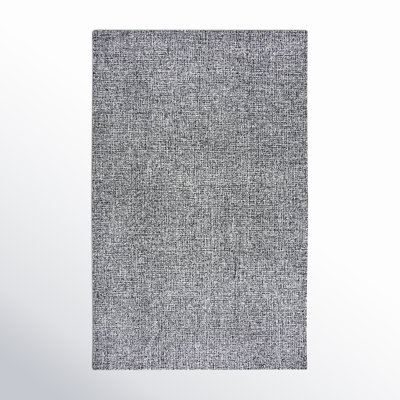 Tapis noir / blanc en laine touffeté à la main Britley