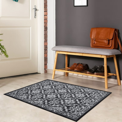 Tapis en polyester tressé à la machine Floral en gris / noir