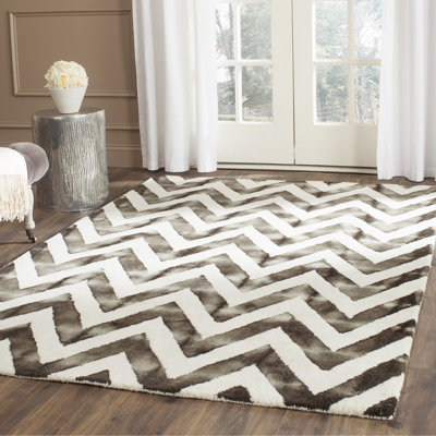 Tapis ivoire / gris anthracite en laine / coton touffeté à la main Vandangle