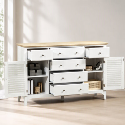 Élégante armoire de rangement avec tiroirs spacieux et design à persiennes, idéale pour les intérieurs modernes et les espaces organisés.