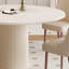Table de salle à manger ronde de style crème et chaise-105343826