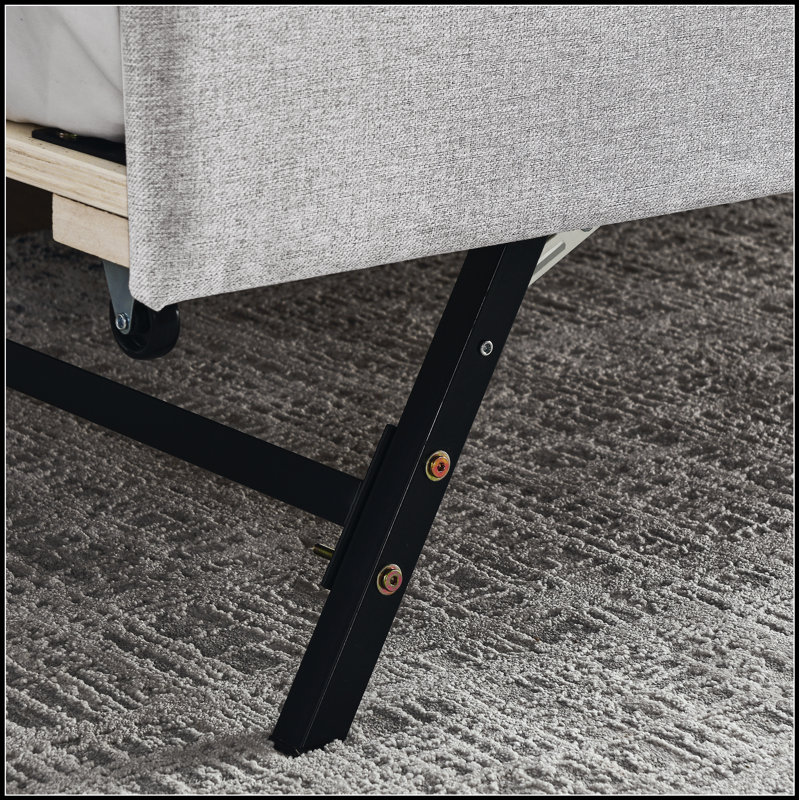 Lit de jour rembourré avec lit gigogne, charge USB et design d'inspiration Mid-Century pour un confort et une fonctionnalité modernes.