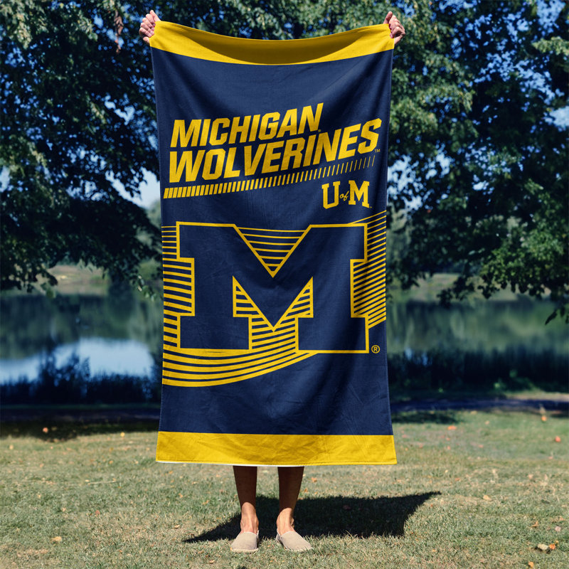 Serviette de plage 30 po x 60 po NCAA Michigan Wolverines