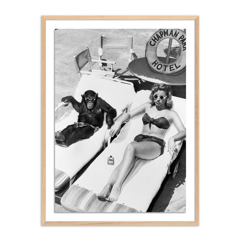 Woman Sunbathing with Chimpanzee by Getty Images, 40" H x 30" W, White Oak Framed