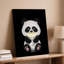 Toile, un joli panda de style dessin animé avec de la fourrure noire et blanche moelleuse est assis dans un environnement sombre tenant une tasse brillante pour l'art mural moderne sur toile-175495529