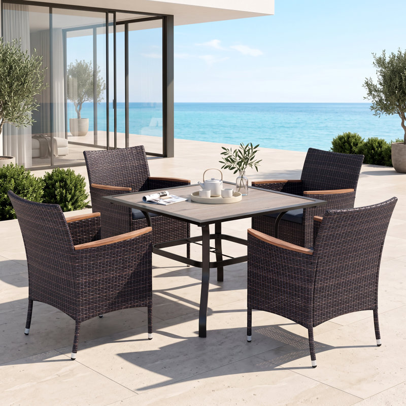 Leonard 4 - Person Patio Dining Set with Square Table , Cushions Included