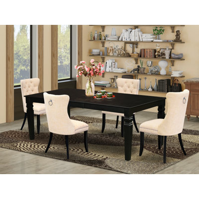 L'ensemble de salle à manger 5 pièces contient une table rectangulaire en bois avec rallonge amovible et 4 chaises rembourrées, noir