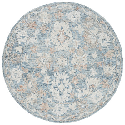 Marquee 506 Hand Tufted Wool/Cotton Oriental Rug in Blue/Rust/Ivory