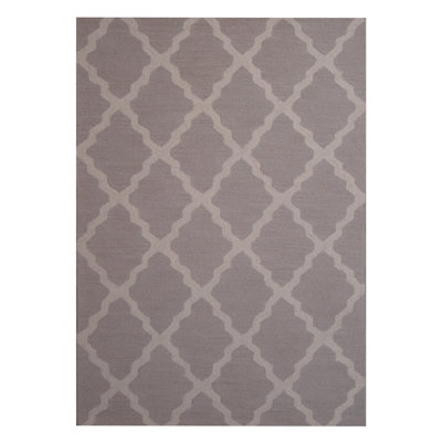 Tapis beige / gris touffeté à la main