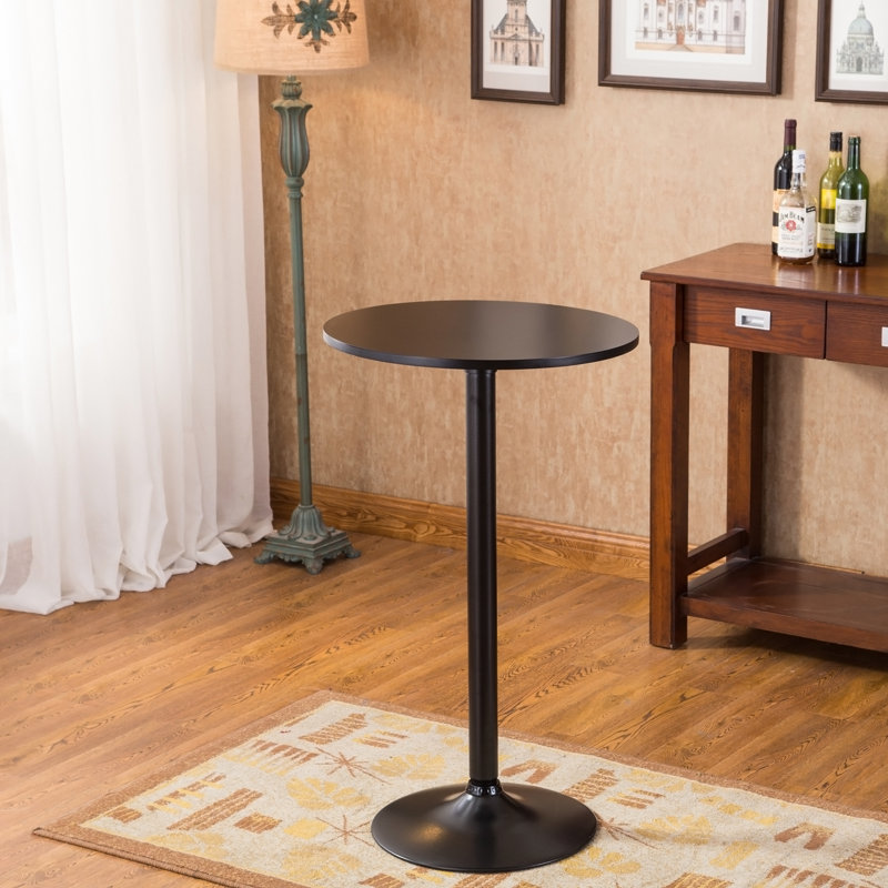 Table ronde noire avec pieds et base en métal noir