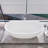 63" Freestanding Solid Surface Bathtub, Double Slipper Deep Soaking Tub, Elegant Design for Modern Bathrooms