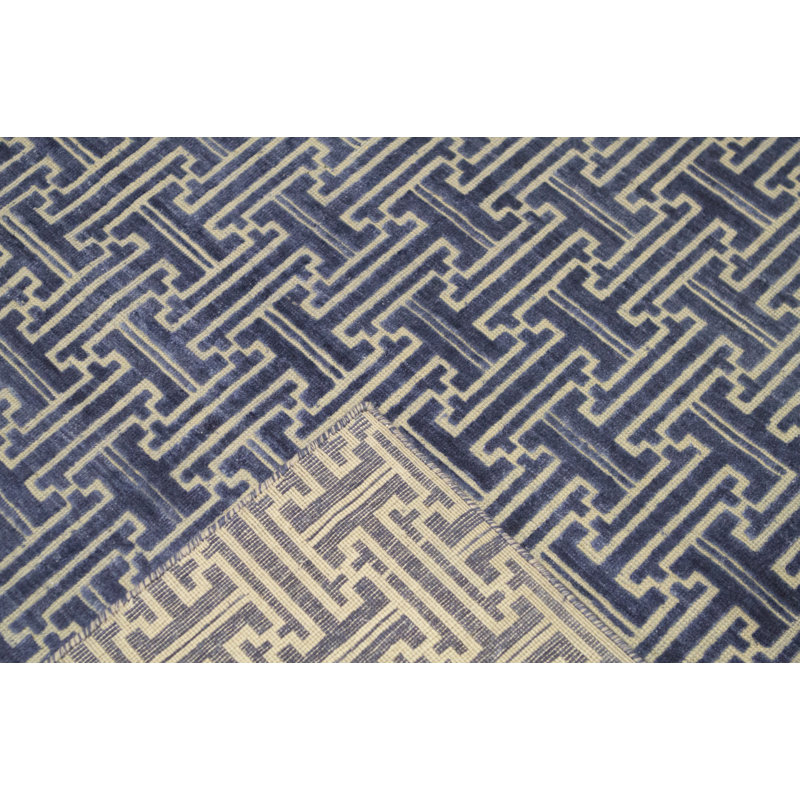 Tapis bleu et ivoire de haute qualité noué à la main