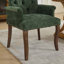 Chaise de salle à manger élégante en tissu chenille, pieds en bois courbés, dossier capitonné et accoudoirs confortables pour intérieurs modernes.-134683117-134683115