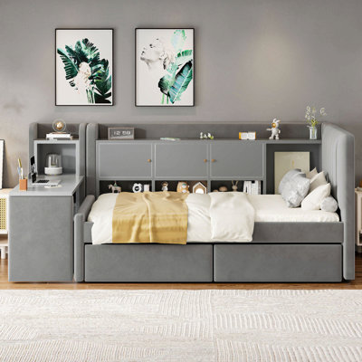 Lit de jour simple tapissier avec tiroirs, tablettes, armoires rabattables et table d'appoint