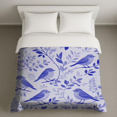 Housses de couette à motifs d'oiseaux colorés sur des branches