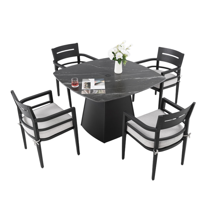Ensemble repas d'extérieur 5 pièces avec plateau en pierre frittée et coussins Sunbrella Harvin