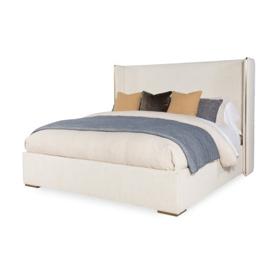 Cadence Upholstered Wingback Bed