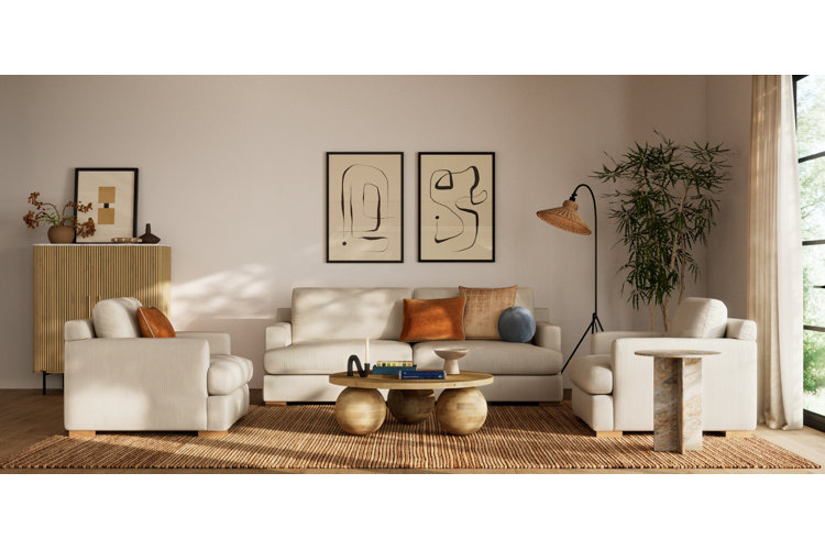 how to decorate your first apartment living room with neutral color palette with tan area rug, white sofa and neutral decor