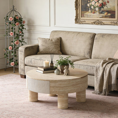 Table basse ronde avec plateau rabattable et compartiment de rangement caché
