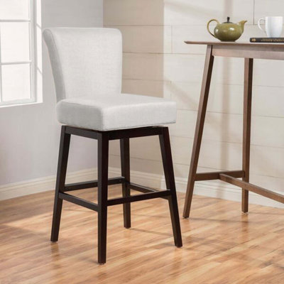 Tabouret de comptoir pivotant avec tissu beige et pieds en bois