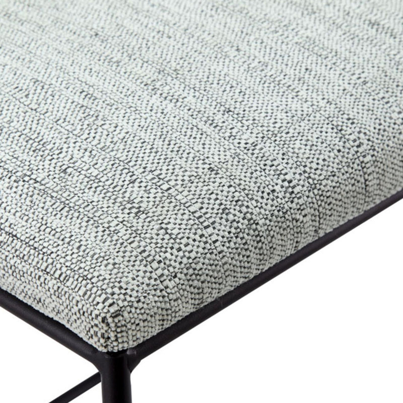 Tabouret de comptoir moderne avec siège en faux lin gris chiné et repose-pieds en métal noir mat, pour un assemblage riche et texturé