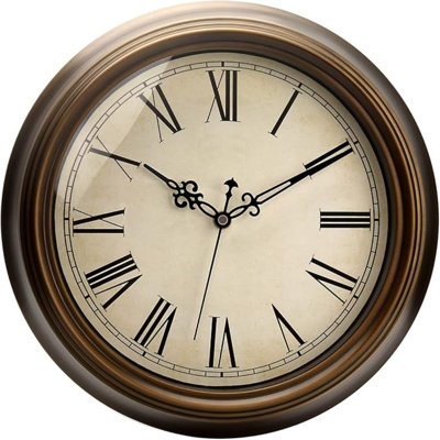 Petite horloge murale en métal Plumeet