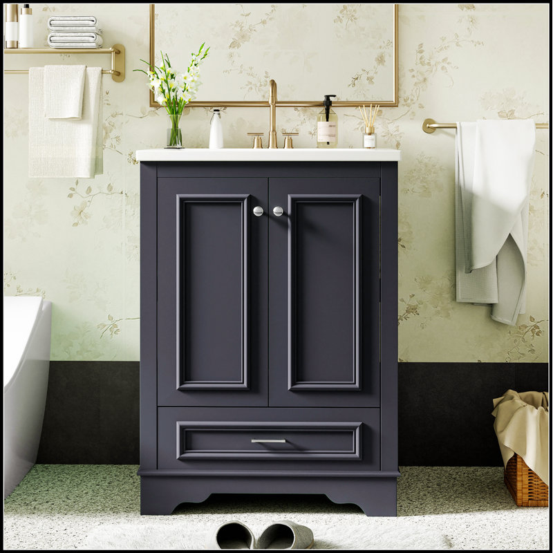 Meuble-lavabo autoportant moderne de 24 pouces avec lavabo en céramique, portes à fermeture douce et rangement spacieux pour des salles de bain élégantes et fonctionnelles
