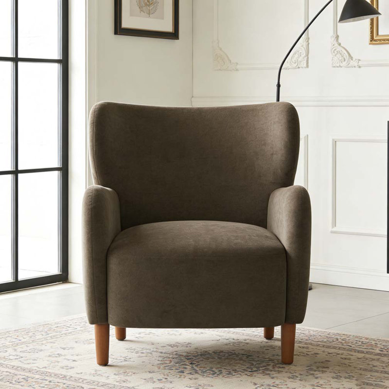 Fauteuil club rembourré à oreilles