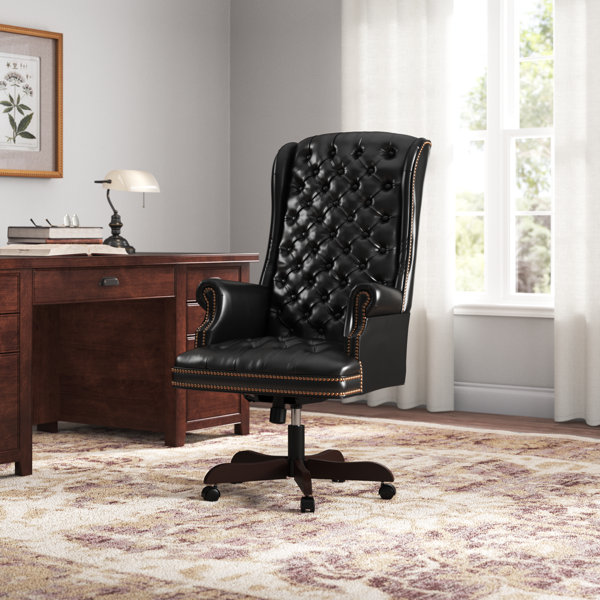 https://assets.wfcdn.com/im/42489323/resize-h600-w600%5Ecompr-r85/2641/264178972/Murphie+High+Back+Traditional+Tufted+LeatherSoft+Executive+Swivel+Ergonomic+Office+Chair.jpg