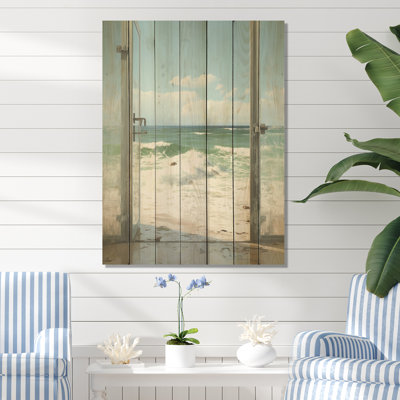 Vue sur la plage du bord de mer - fenêtres côtières sur bois