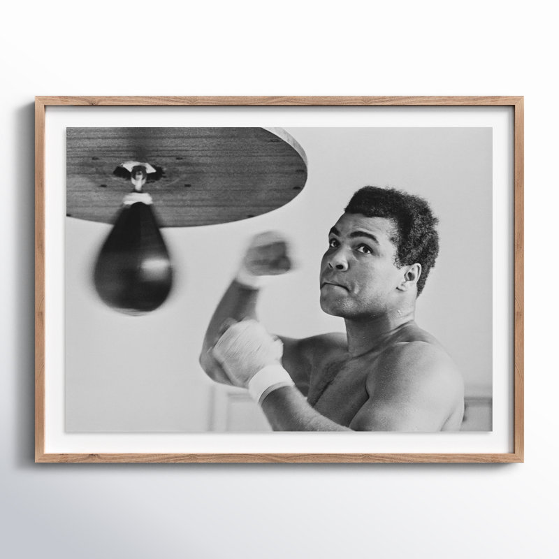 Muhammad Ali Punching Bag by Getty Images, Rustic Walnut Framed, 36" H x 48" W