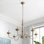 Lustre classique à 6 lumières de style bougie Calando avec finition colombe vieillie