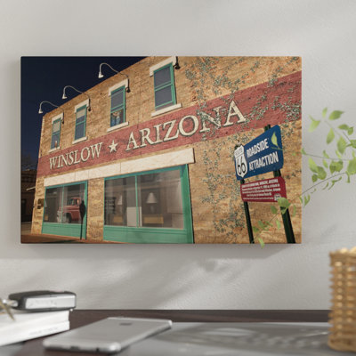 " U.S. Route 66 Standin' On The Corner Park Roadside Attraction, Winslow, Arizona, USA " by Walter Bibikow