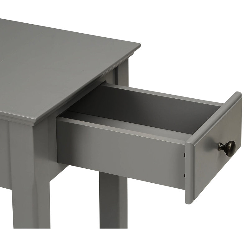 Table rectangulaire grise avec rangement ouvert sur la tablette inférieure et les pieds