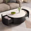 Table basse élégante à conception ronde avec roulettes, parfaite pour les petits espaces