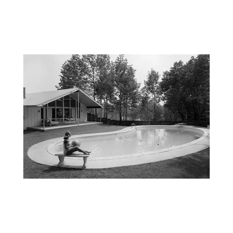 1950S 1960S Blond Woman Bathing Suit Sitting On Stone Bench Beach Ball Near Kidney Shaped Swimming Pool by Vintage Images - Wrapped Canvas Print