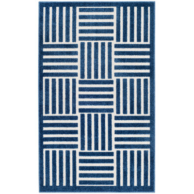 Tapis à carreaux Zaniyah Performance