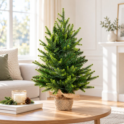 Sapin de Noël artificiel miniature à pointes illuminées, 61 cm / 91 cm / 122 cm, idéal pour une décoration personnalisée. Pot en plastique rempli de ciment et recouvert de toile de jute pour les modèles de 61 cm et 91 cm, base en métal pour le modèle de 122 cm. Sapin de table pour une décoration intérieure polyvalente pendant les fêtes.