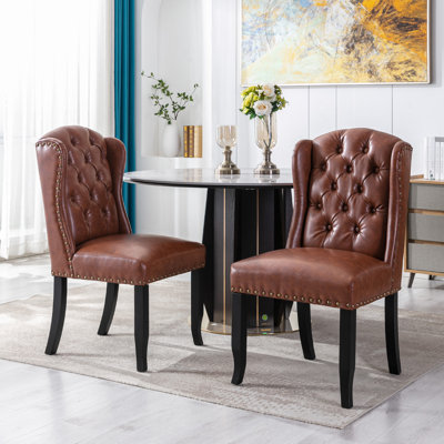 Chaise de salle à manger à garniture cloutée et capitonnée Jolynn