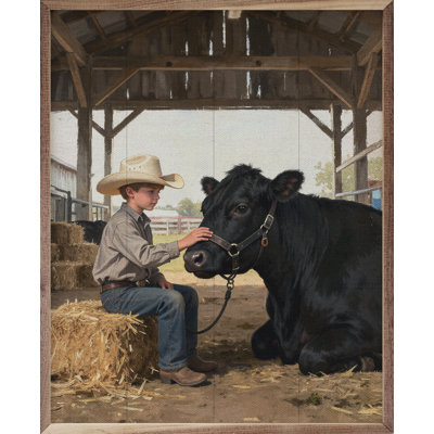 A Boy And His Beef Cow Laying