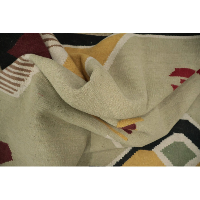 Tapis tribal kilim 10 x 13 avec des tons terreux et des formes audacieuses