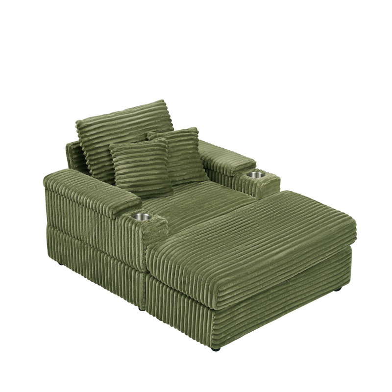Canapé simple en velours côtelé vert avec un coussin, deux coussins décoratifs, un repose-pieds et deux espaces de rangement