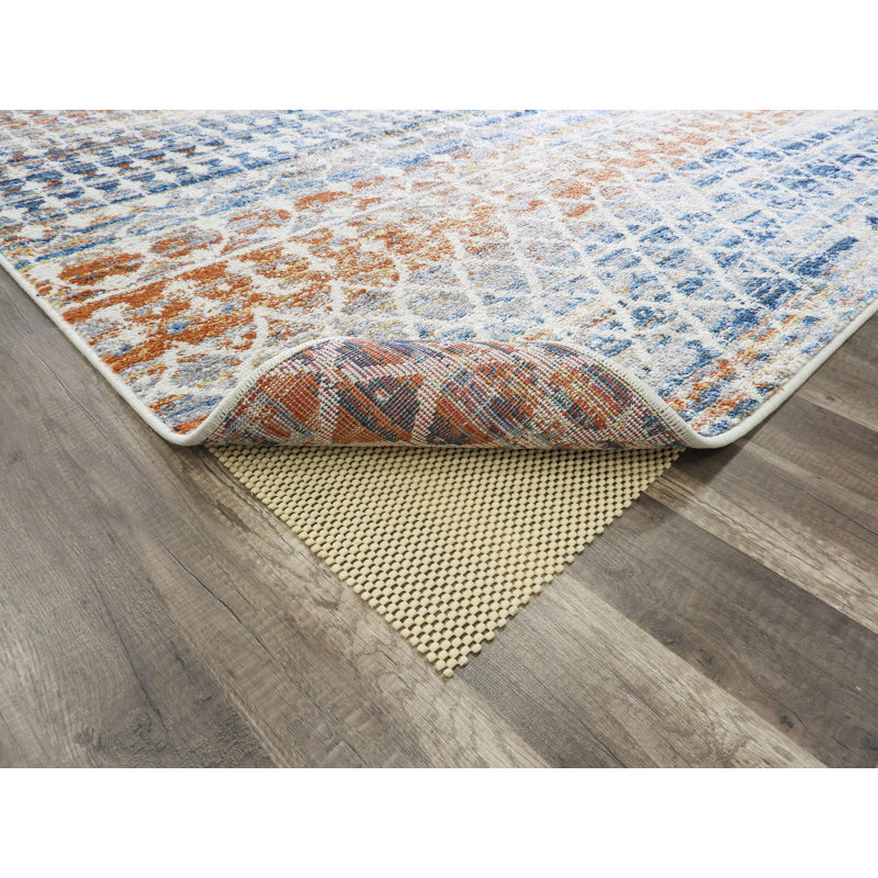 Ivory and Blue Rectangular Abstract Synthetic Area Rug