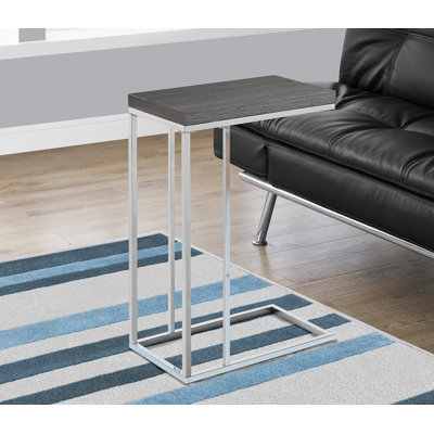 Table d'appoint en forme de C avec plateau en stratifié gris et structure en métal noir, parfaite pour les espaces de vie modernes