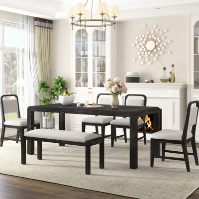 Table extensible pour 4 à 6 personnes, style vintage, extension fluide, siège confortable pour les repas de famille, finition soignée, pieds galbés, chaises et banc robustes.