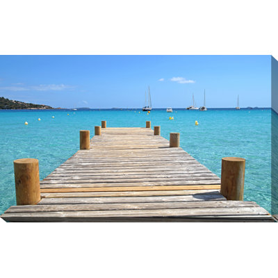 " Wood Pier On The Beach "