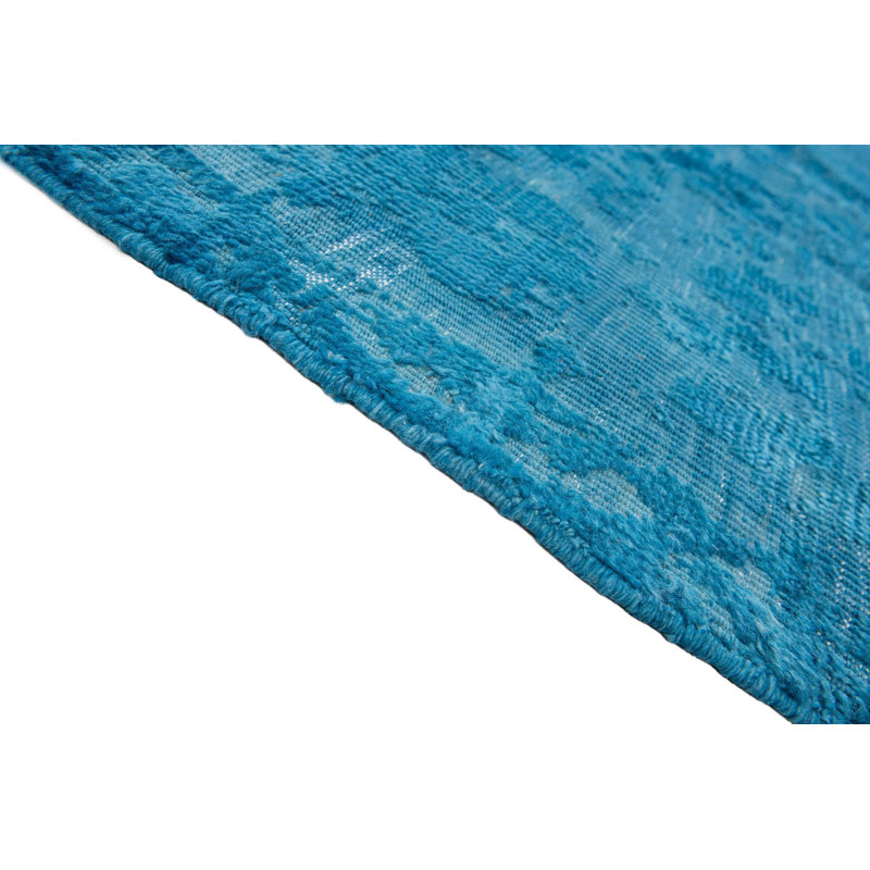Tapis bleu Kalmanovitz