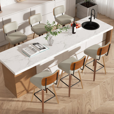 Tabouret pivotant rembourré à hauteur de bar